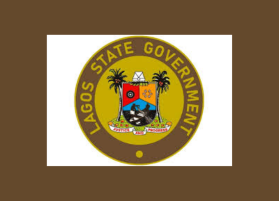 a yellow and brown circle with a coat of arms and palm trees