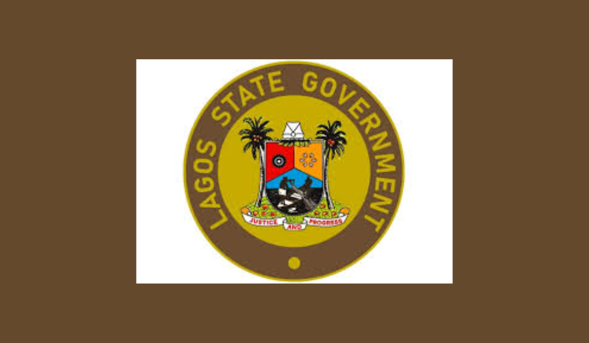 a yellow and brown circle with a coat of arms and palm trees